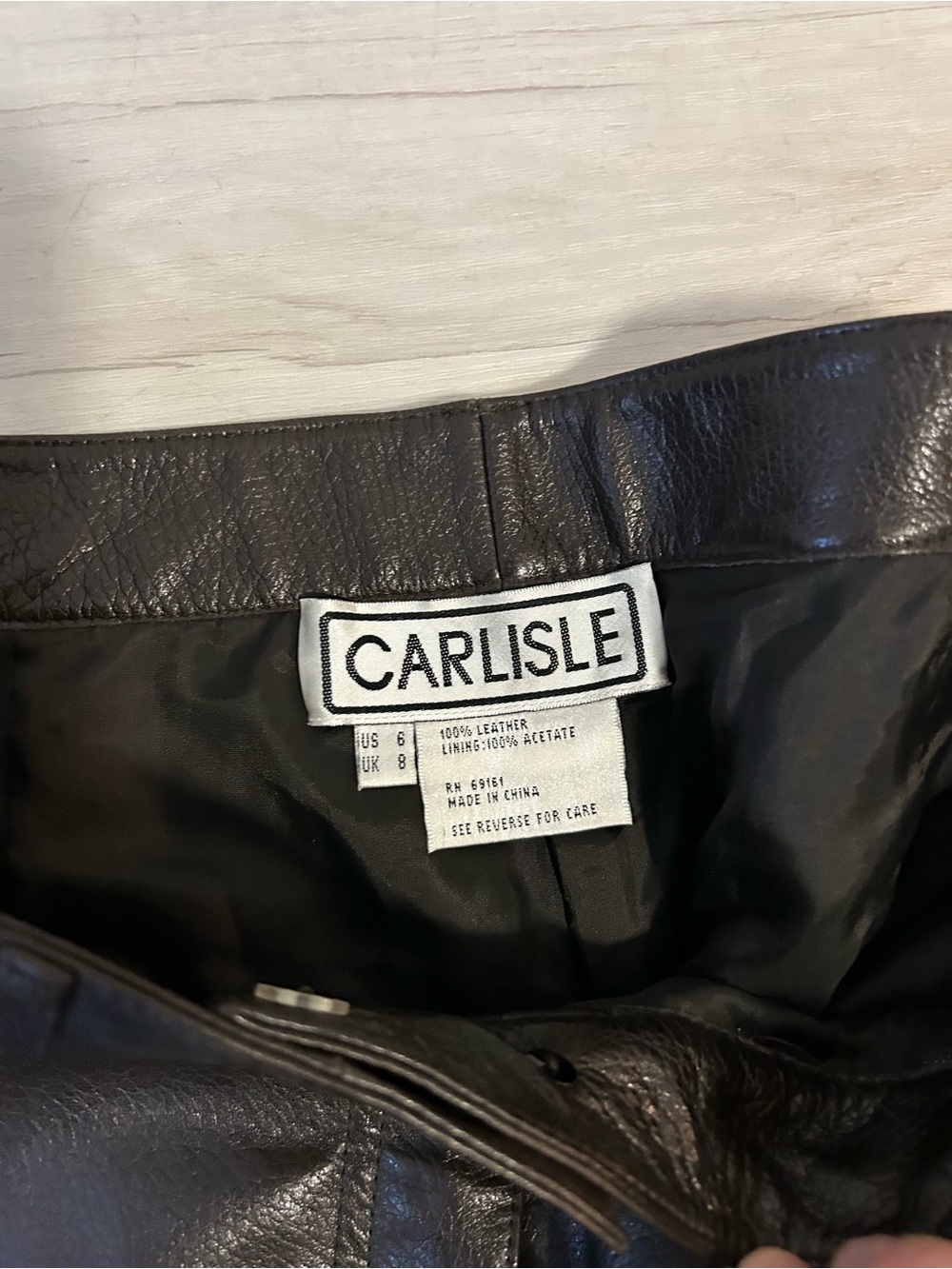 Carlisle Black Faux Leather Boot-Cut Pants